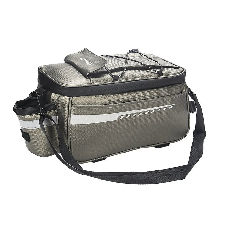 A commuter e-bike with a mounted rear rack bag illustrates how carrying needs can affect a first accessory purchase.