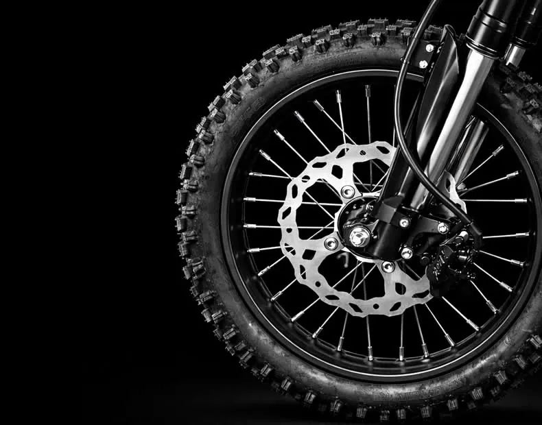 Close-up of a CEMOTO D03 hydraulic disc brake and front wheel